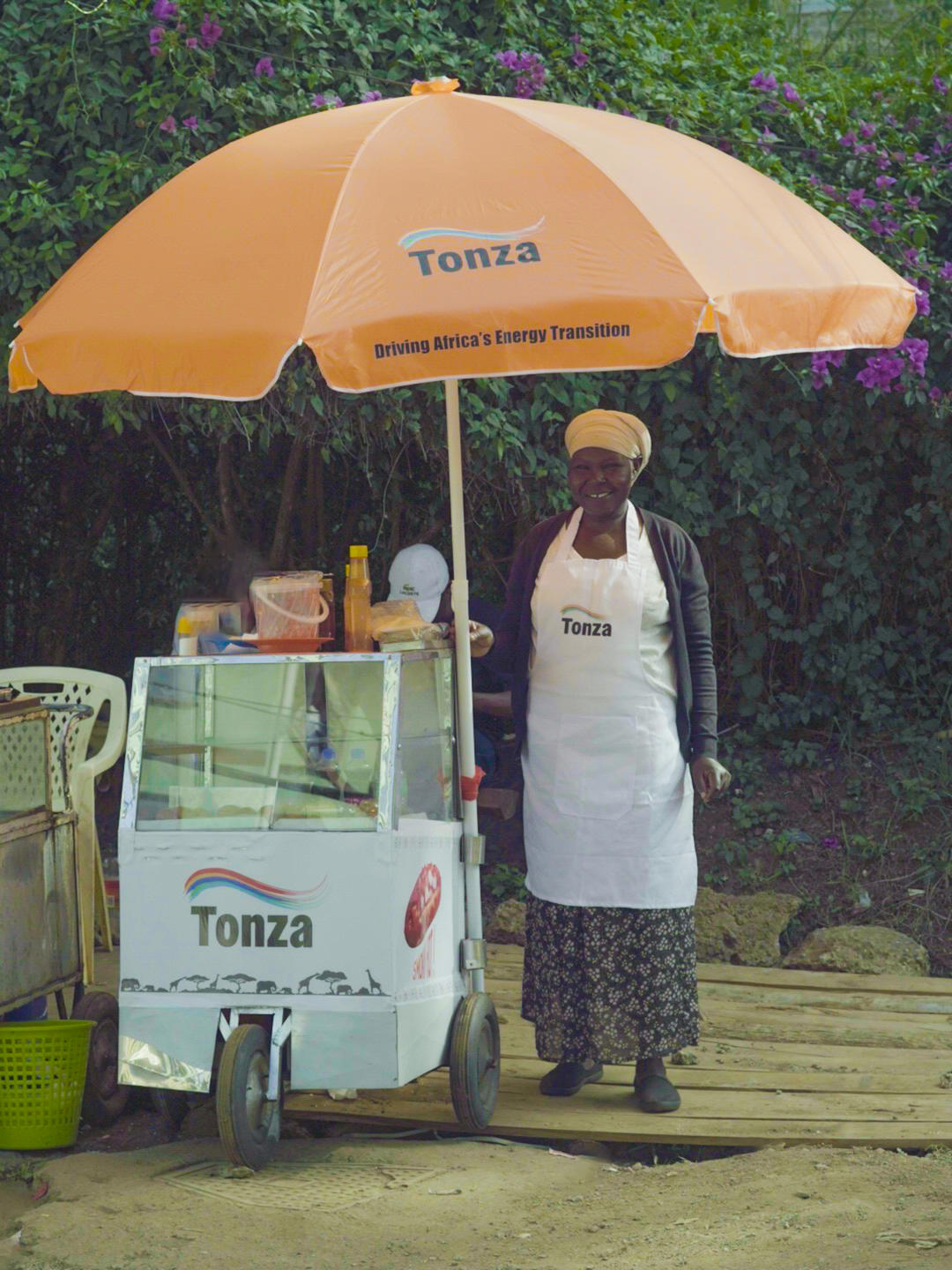 Vendor under Tonza solar umbrella