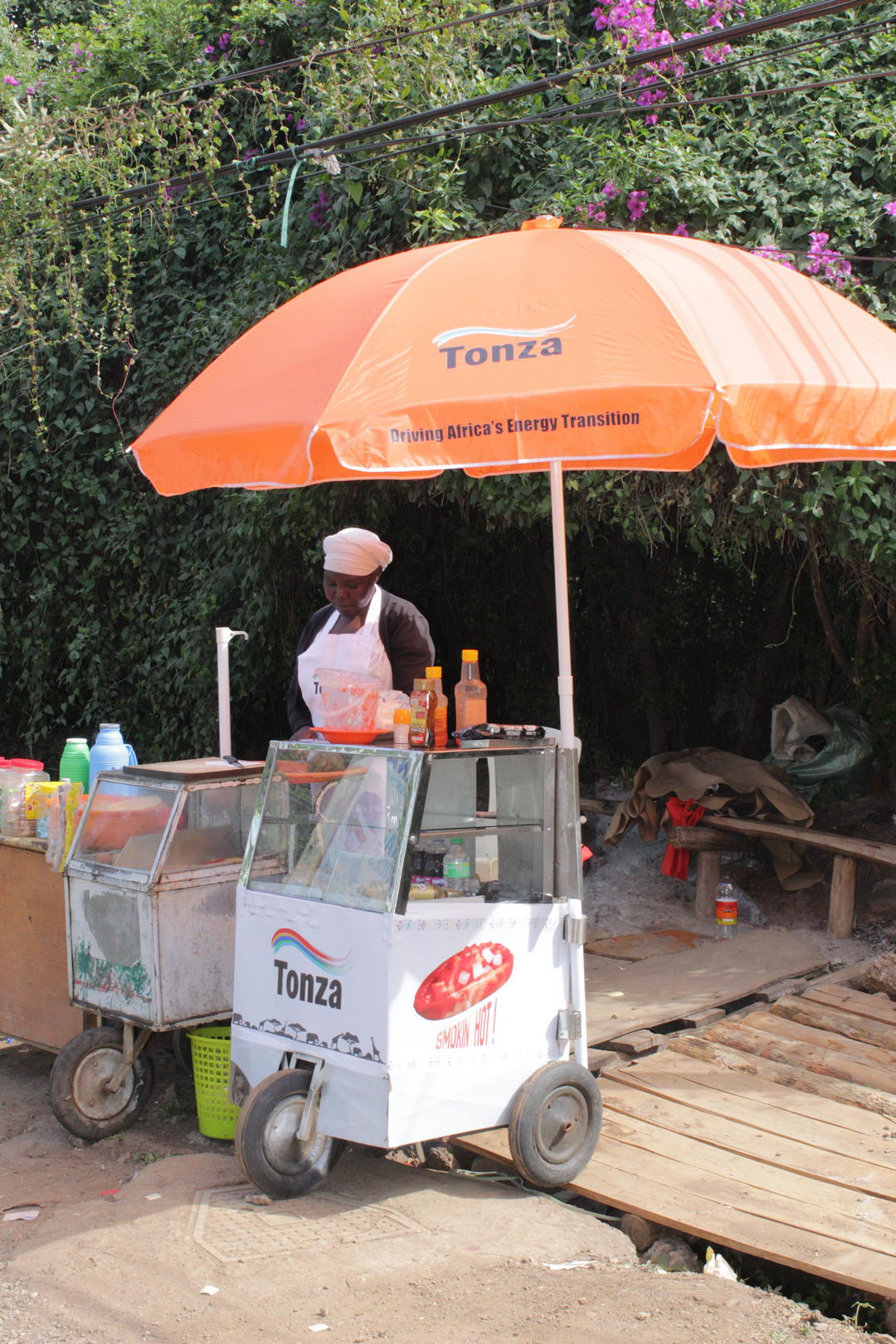 Vendor with Tonza cart cooler box